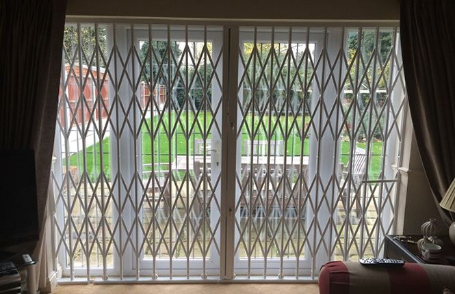 RSG1000 retractable grille fitted to the patio door of a residential property in Romford.
