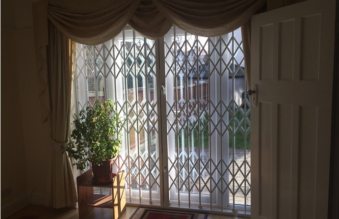 RSG1000 retractable patio door security grilles securing a residence in North London.