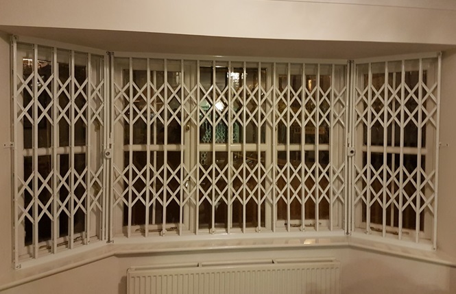RSG1000 retractable security grilles providing security to a residential property in West Hendon.