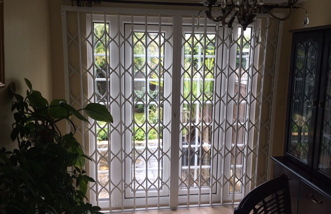RSG1200 LPS1175 SR1 collapsible patio door grille fitted to a residence in Harlow.