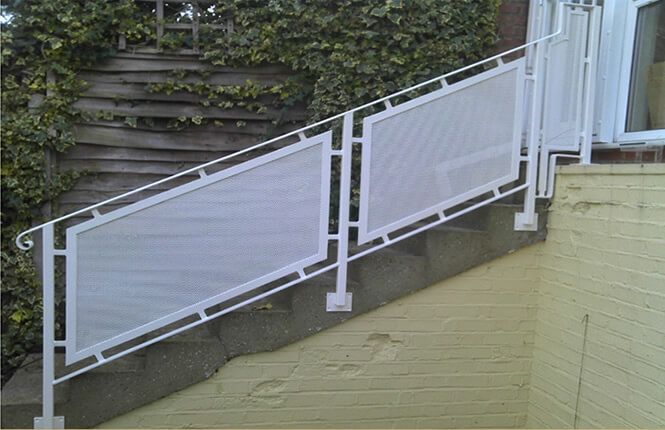 Stylish RSG4400 railings on domestic stairs in Wimbledon.