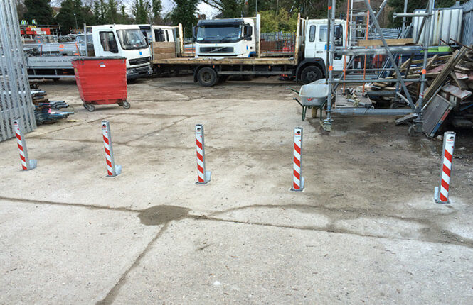 RSG4600 bollards restricting access on industrial warehouse in Mitcham.