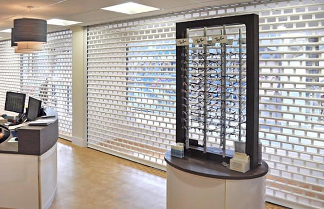 RSG5600 shop front roller shutters securing Raylings Opticians in Eastleigh.