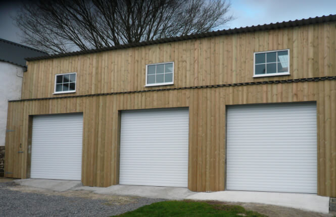 RSG7000 insulated roller doors on three garages in Middlesex.